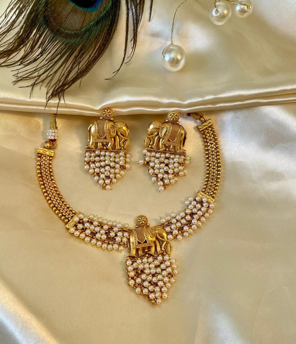 Traditional Golden Elephant Necklace Set with Jhumka Earrings