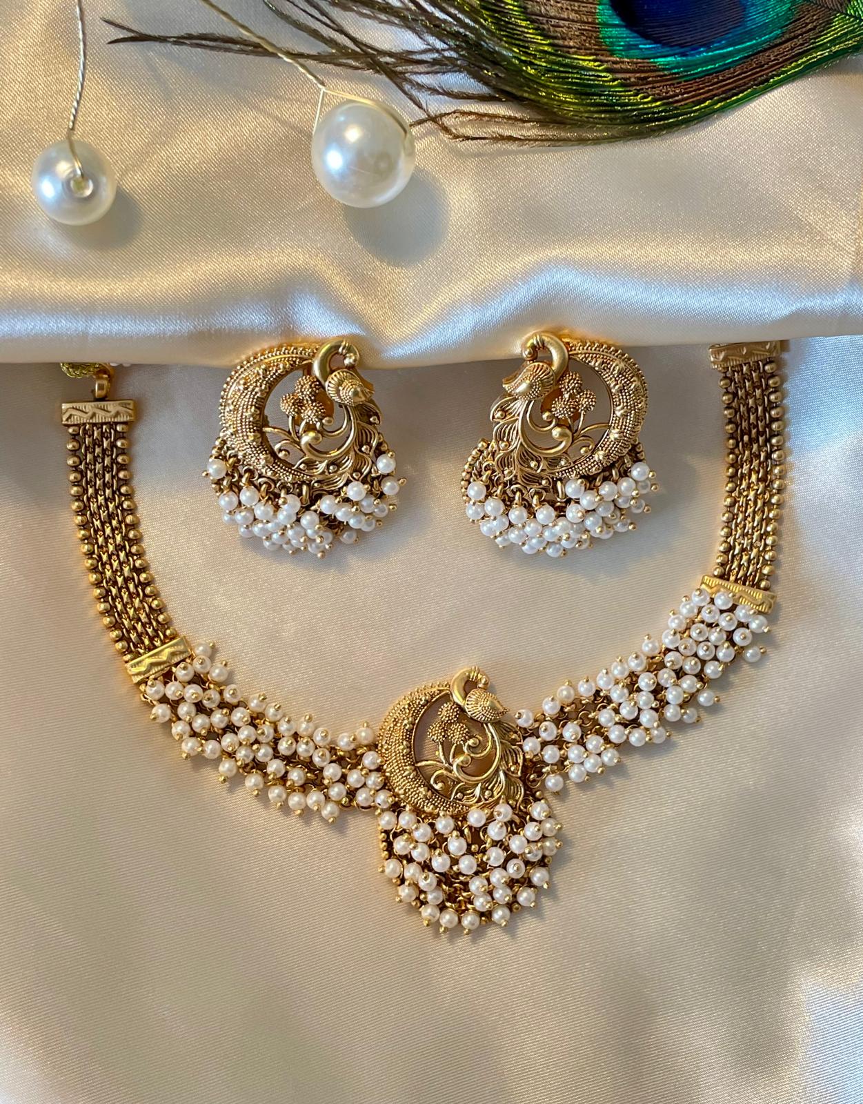 Elegant Peacock Pearl Necklace Set with Gold Detailing