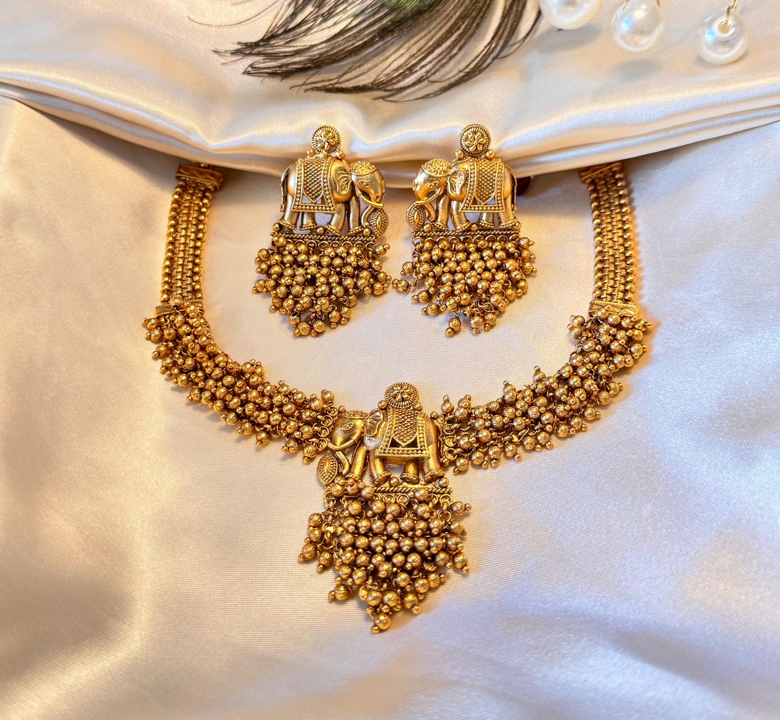 Traditional Golden Elephant Necklace Set with Jhumka Earrings